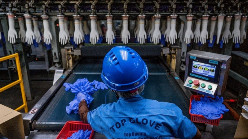 afp-20201123-malaysia-top-glove-1606132048869.jpg